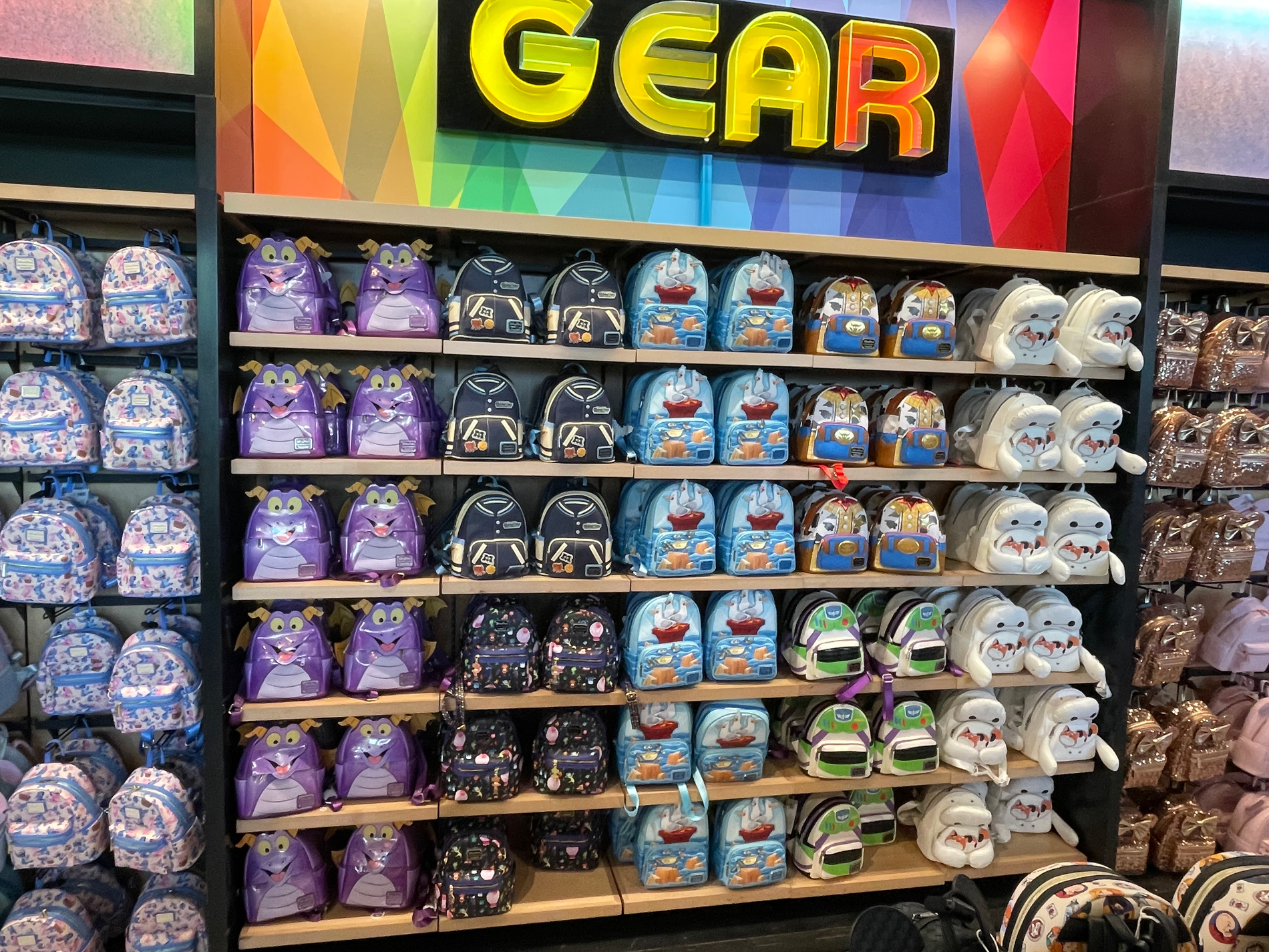 Loungefly Backpacks, Wall of Loungefly backpacks at Disney